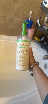 Photo de l’emballage : 100% Virgin Coconut Oil Moisture Boosting Shampoo